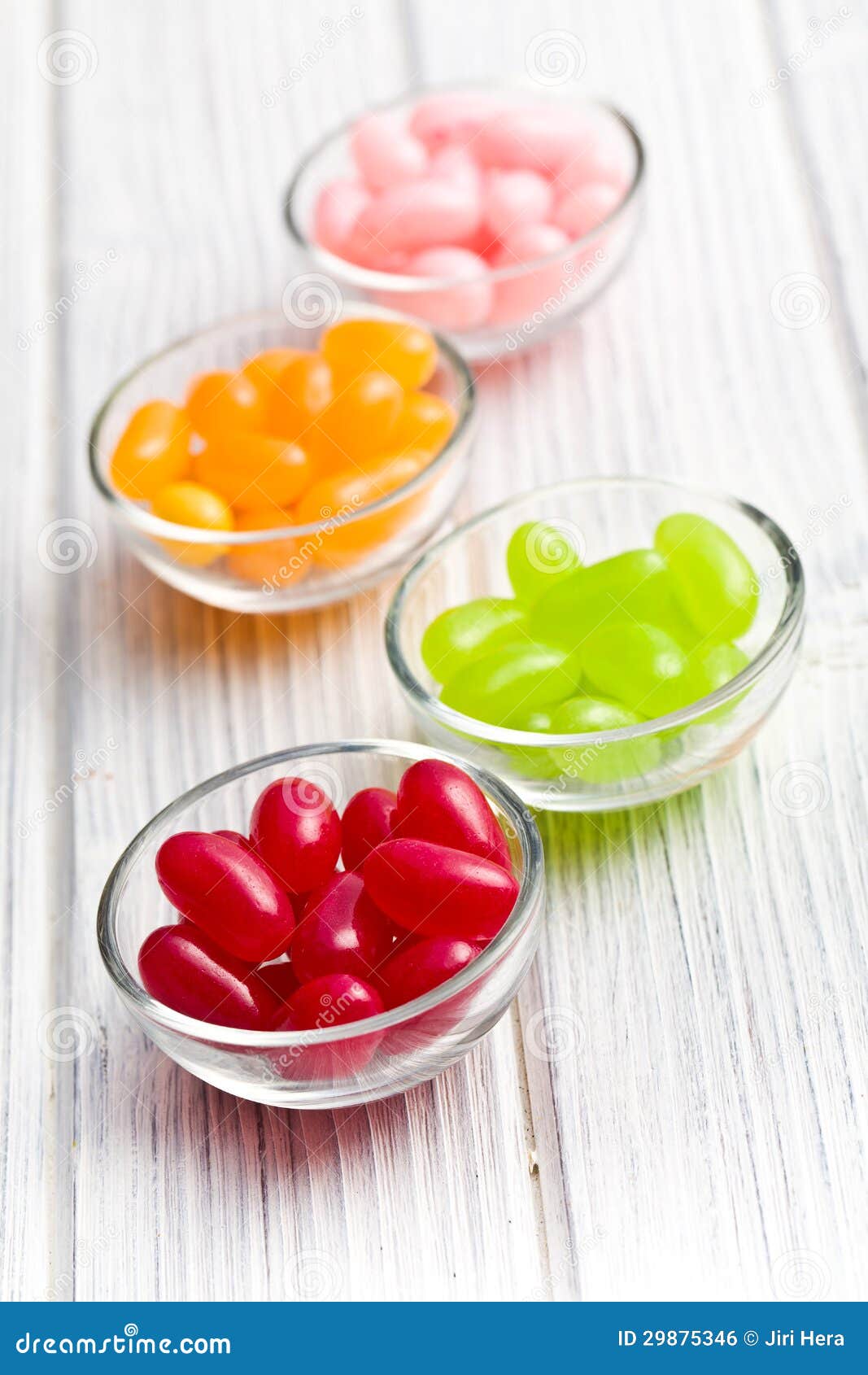 Jelly beans in glass bowl stock photo. Image of background 29875346