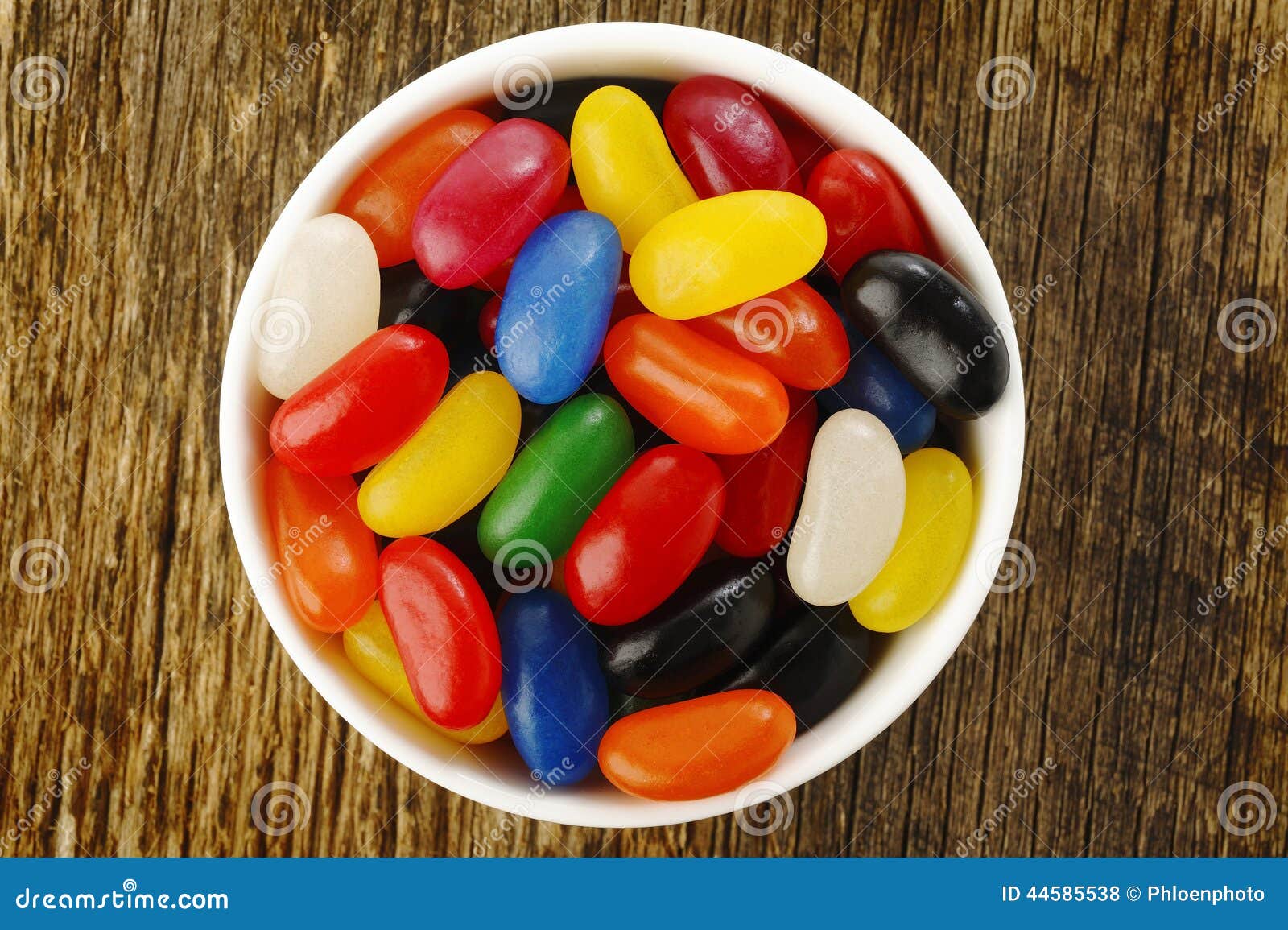 Jelly beans on wooden background