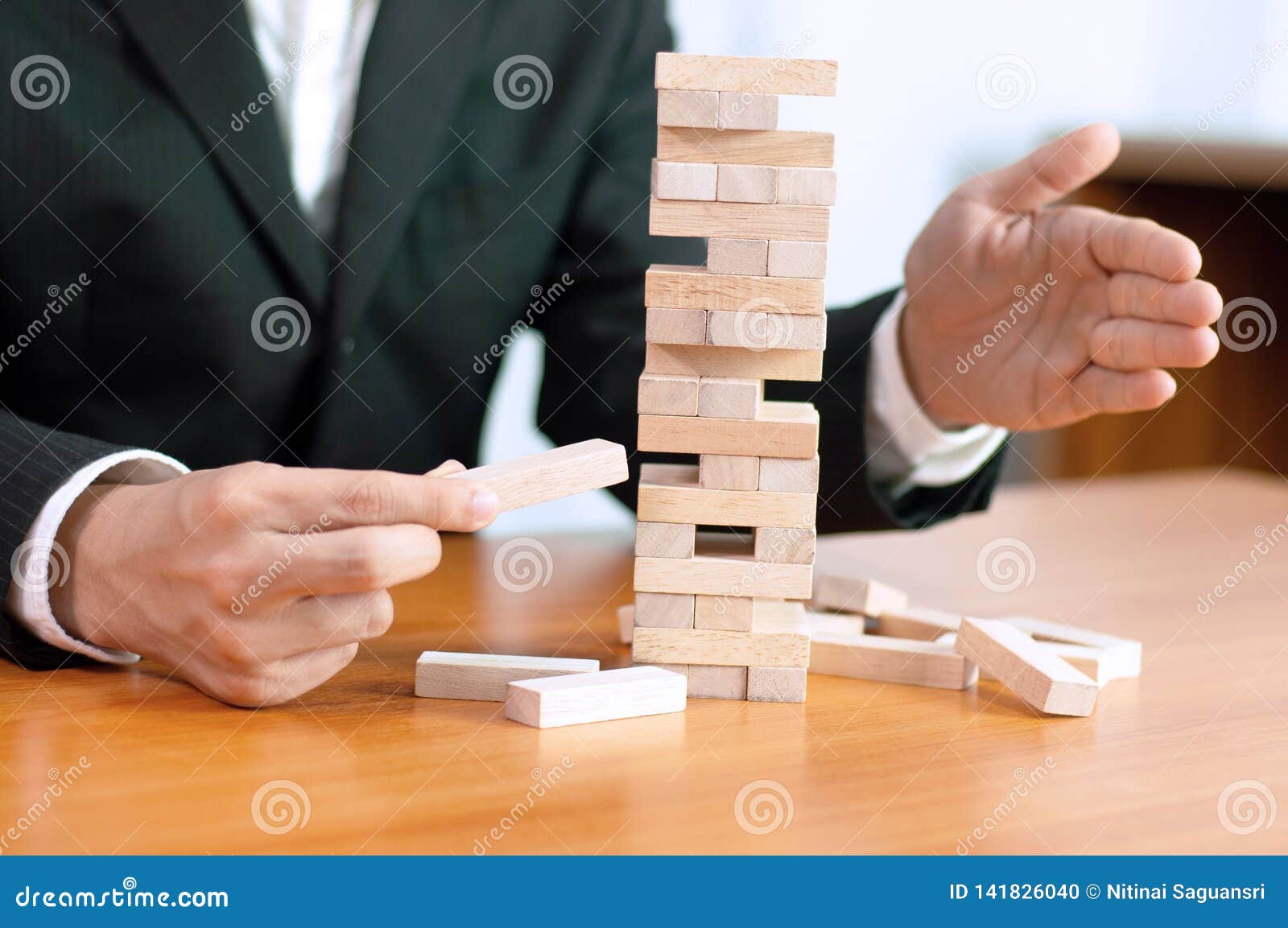 jenga business game, business fulfillment building a business base failed business base stable and unstable business base.