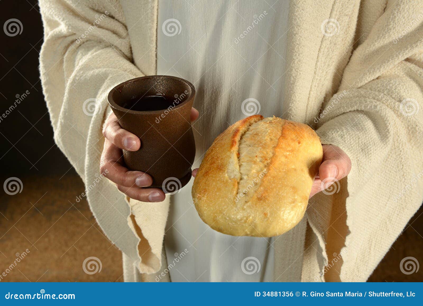 jesus holding bread and wine