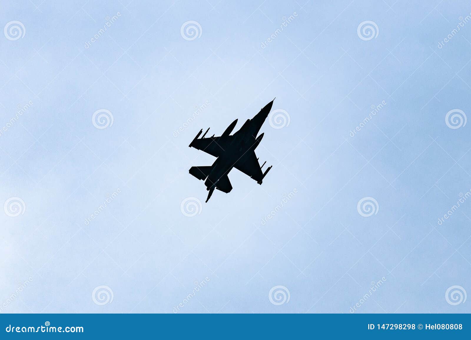 Jet Fighter in Backlight in Blue Sky Stock Photo - Image of backlight ...