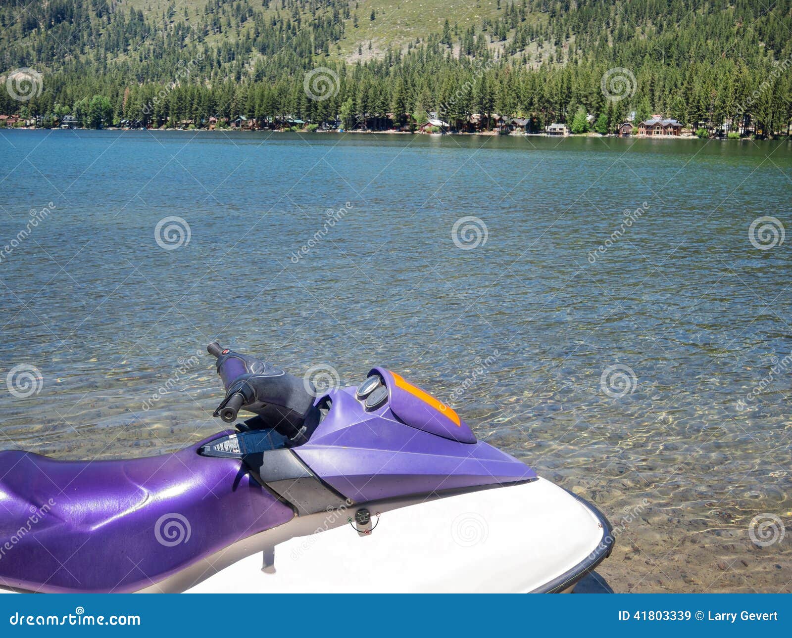 The lake is a freshwater lake in northeast california on the eastern slope of the sierra nevada and about ten miles northwest of the much larger lake tahoe which is one of the most visited lakes in california. Jet ski on Donner Lake stock image. Image of pleasure 41803339