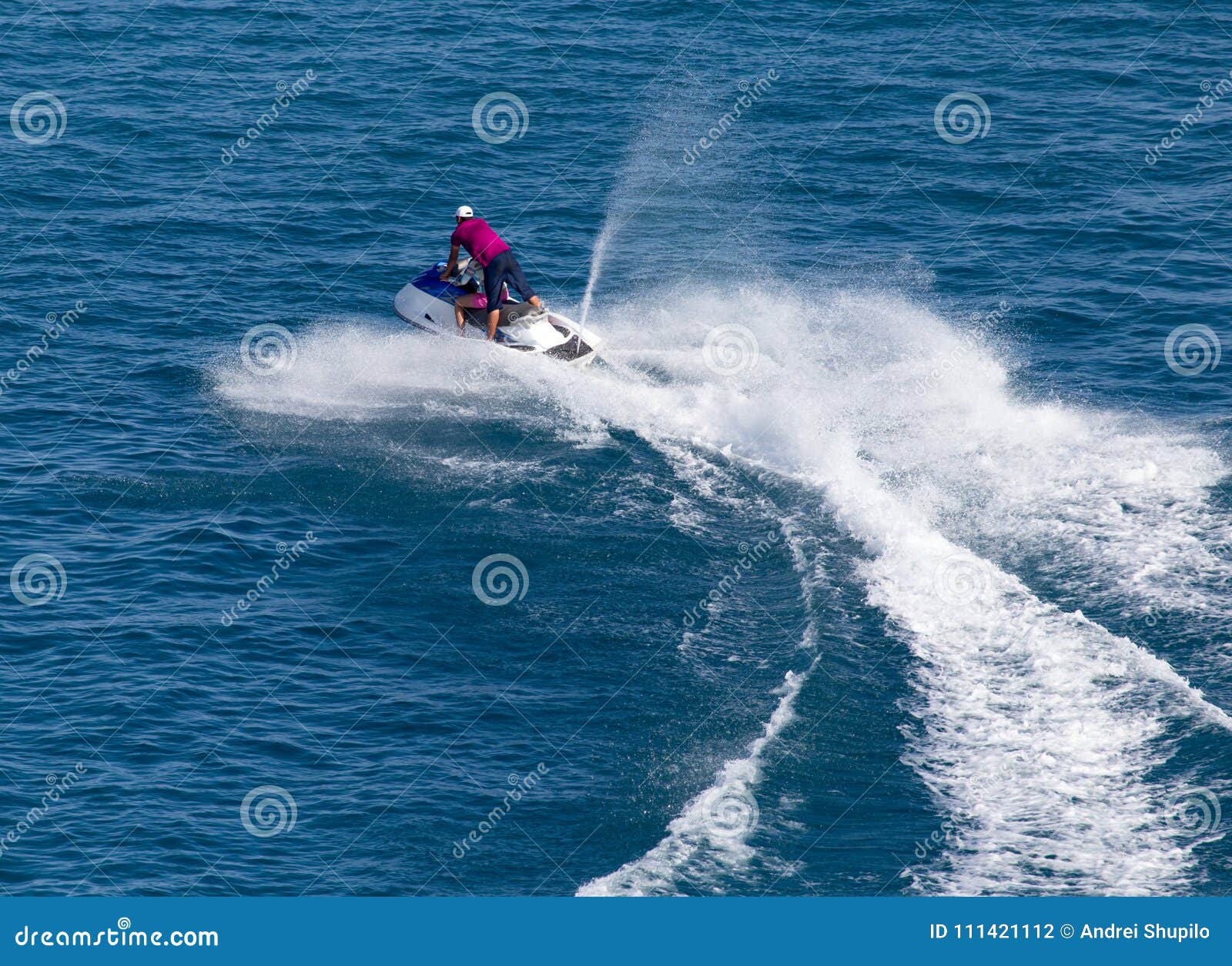 Jet Ski on the Surface of the Water at a Speed of Stock Photo Image