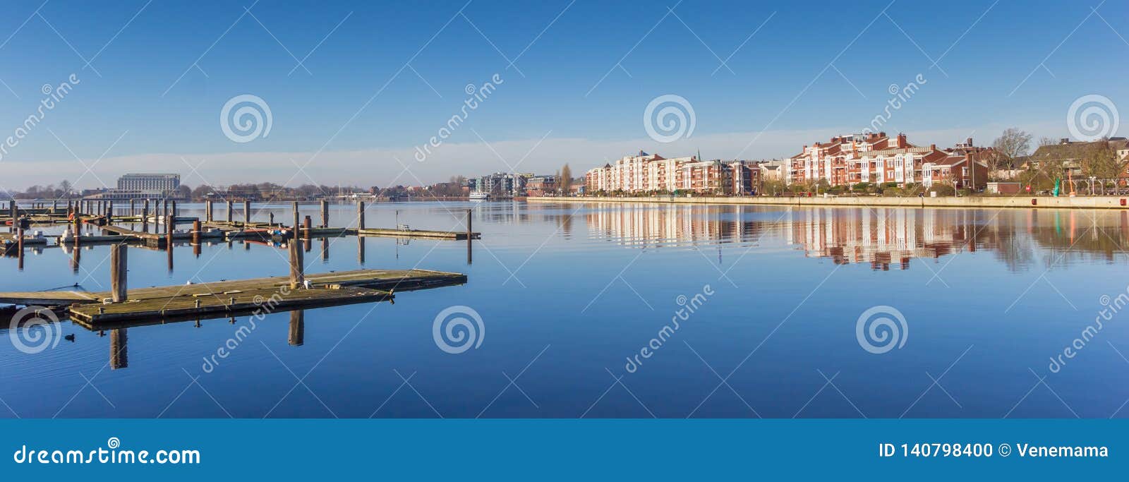 Jetty and Apartment Buildings at the Waterfront in Wilhelmshaven Editorial Image Image of