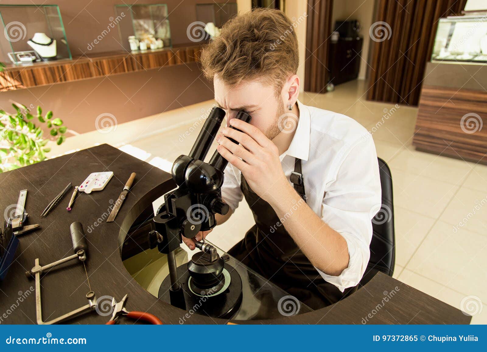 Jeweler Examines the Ring through a Microscope Stock Image Image of