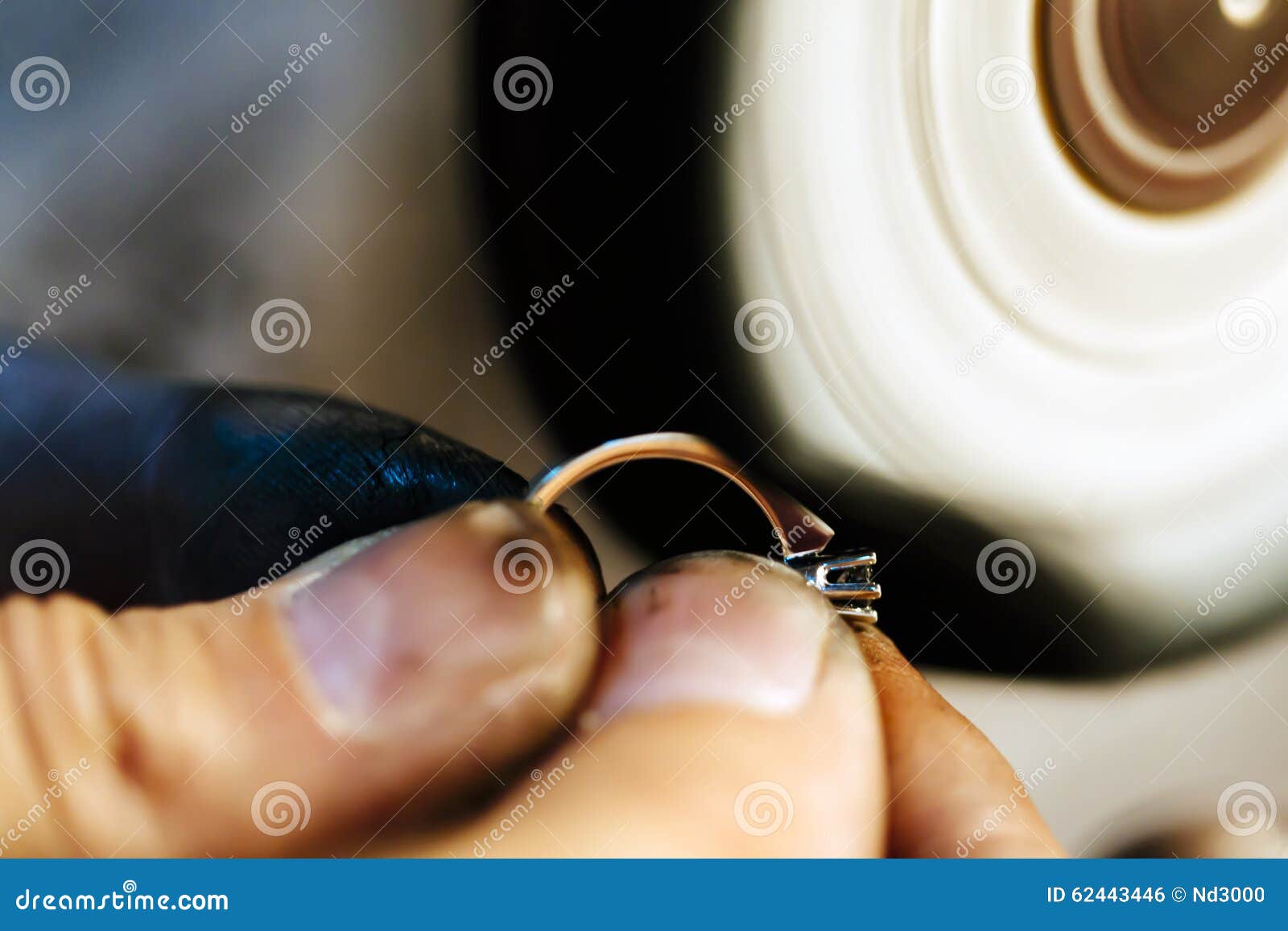 Jewelery polishing ring stock photo. Image of finger 62443446