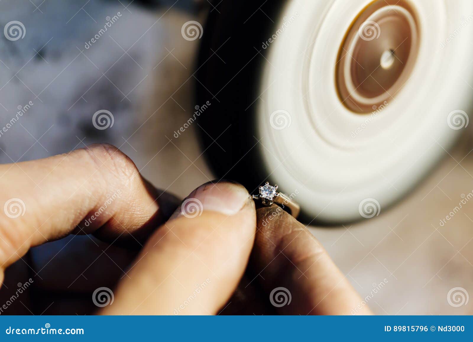 Jewelery polishing ring stock photo. Image of hand, diamond 89815796