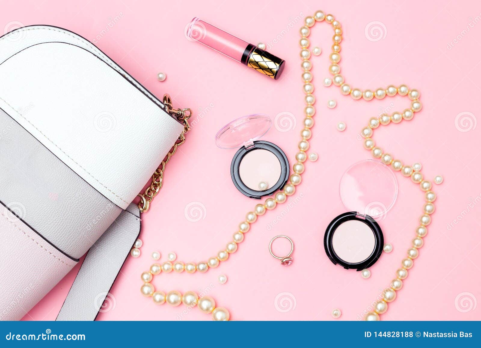 Jewelry and Beauty Make Up on Pink Background. Flat Lay Stock Photo ...