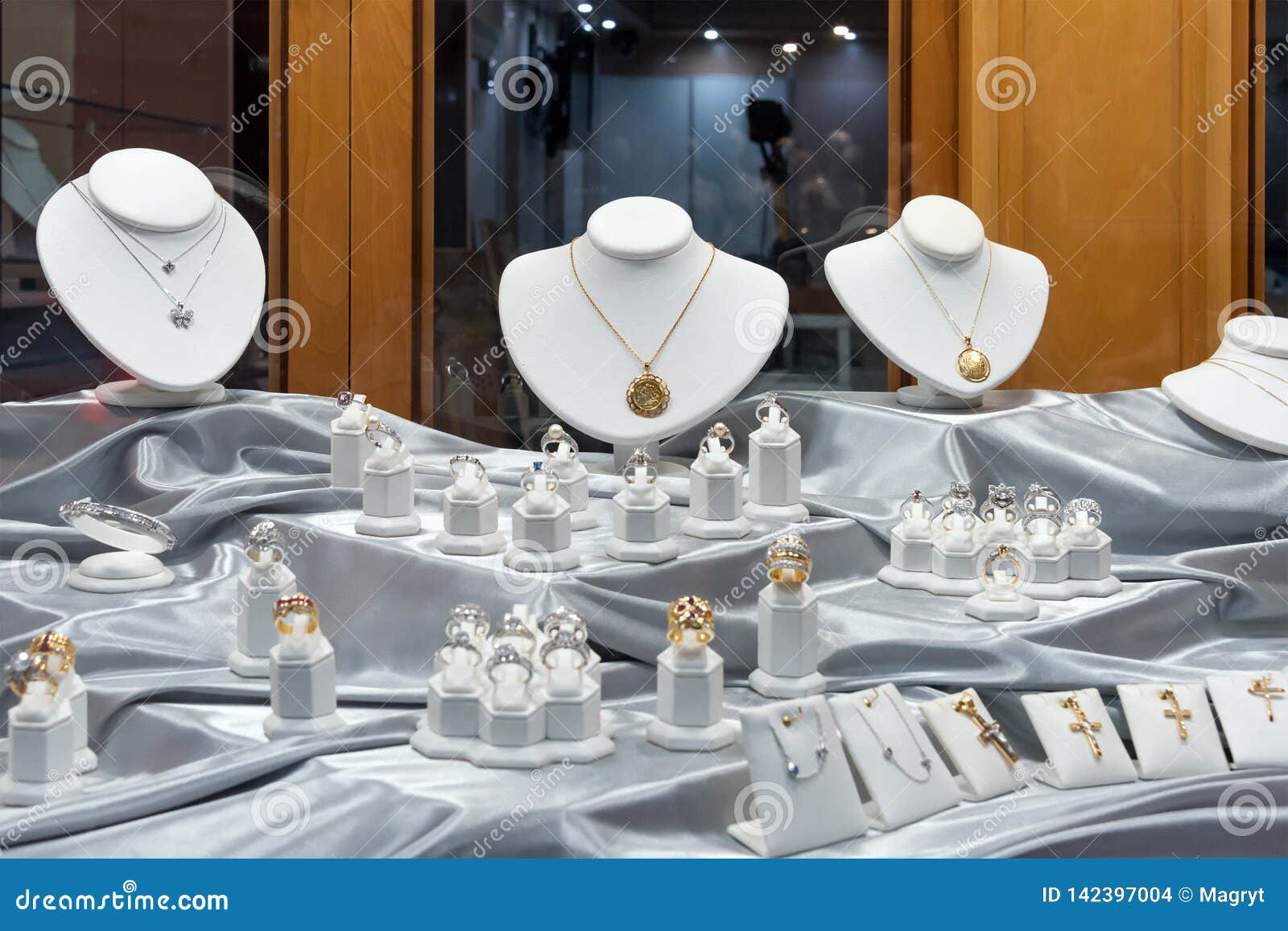 jewelry-diamond-rings-necklaces-show-luxury-retail-store-window-display-showcase-142397004.jpg