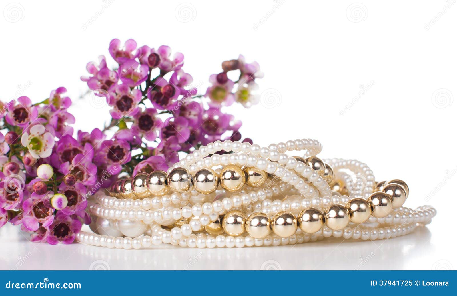 Jewelry and flowers stock image. Image of metallic, jewel 37941725