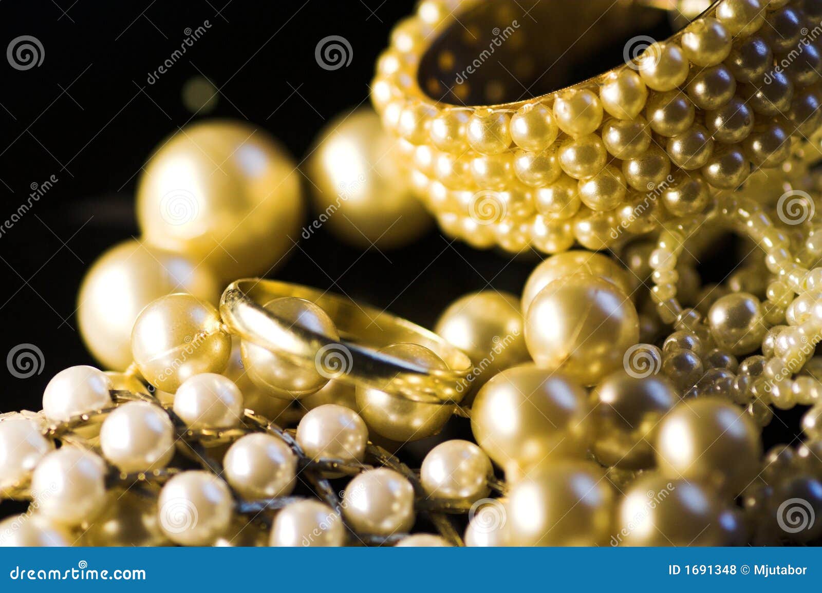 Jewelry: gold and pearls stock photo. Image of wear, accessories - 1691348