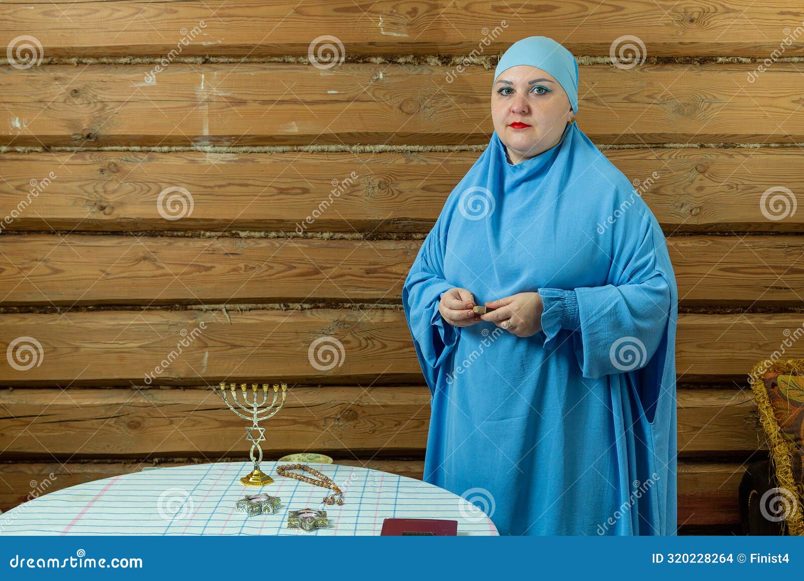 jewish woman in a blue veil, kabbalat shabbat ceremony