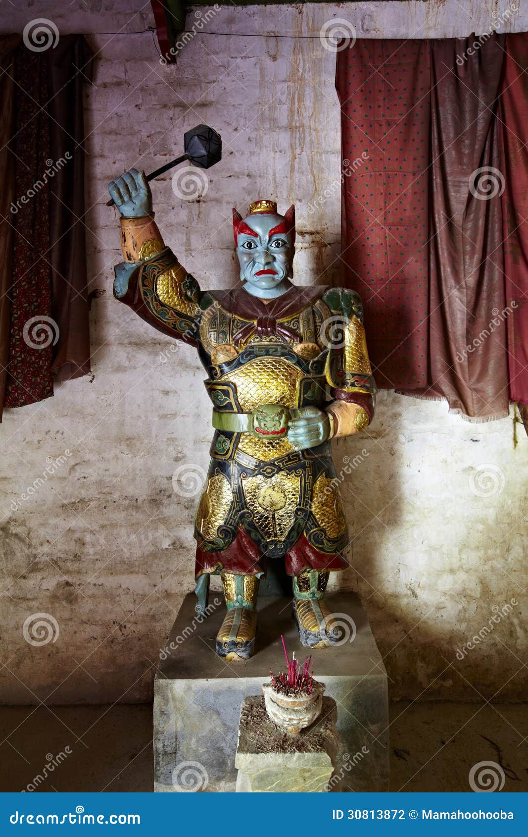 jiangxi, china: statue of underworld magistrate