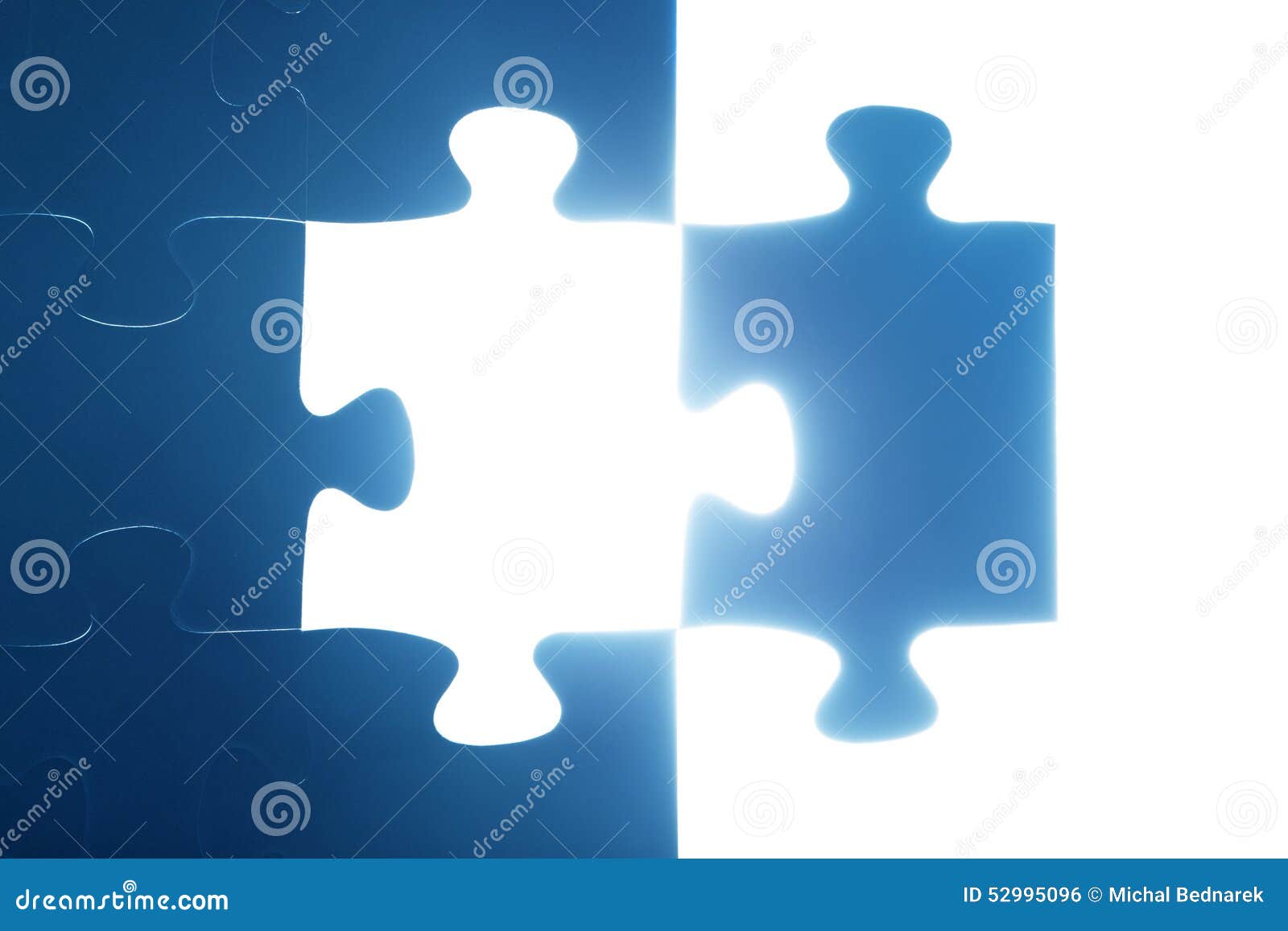 jigsaw puzzle piece missing. light glowing. solution