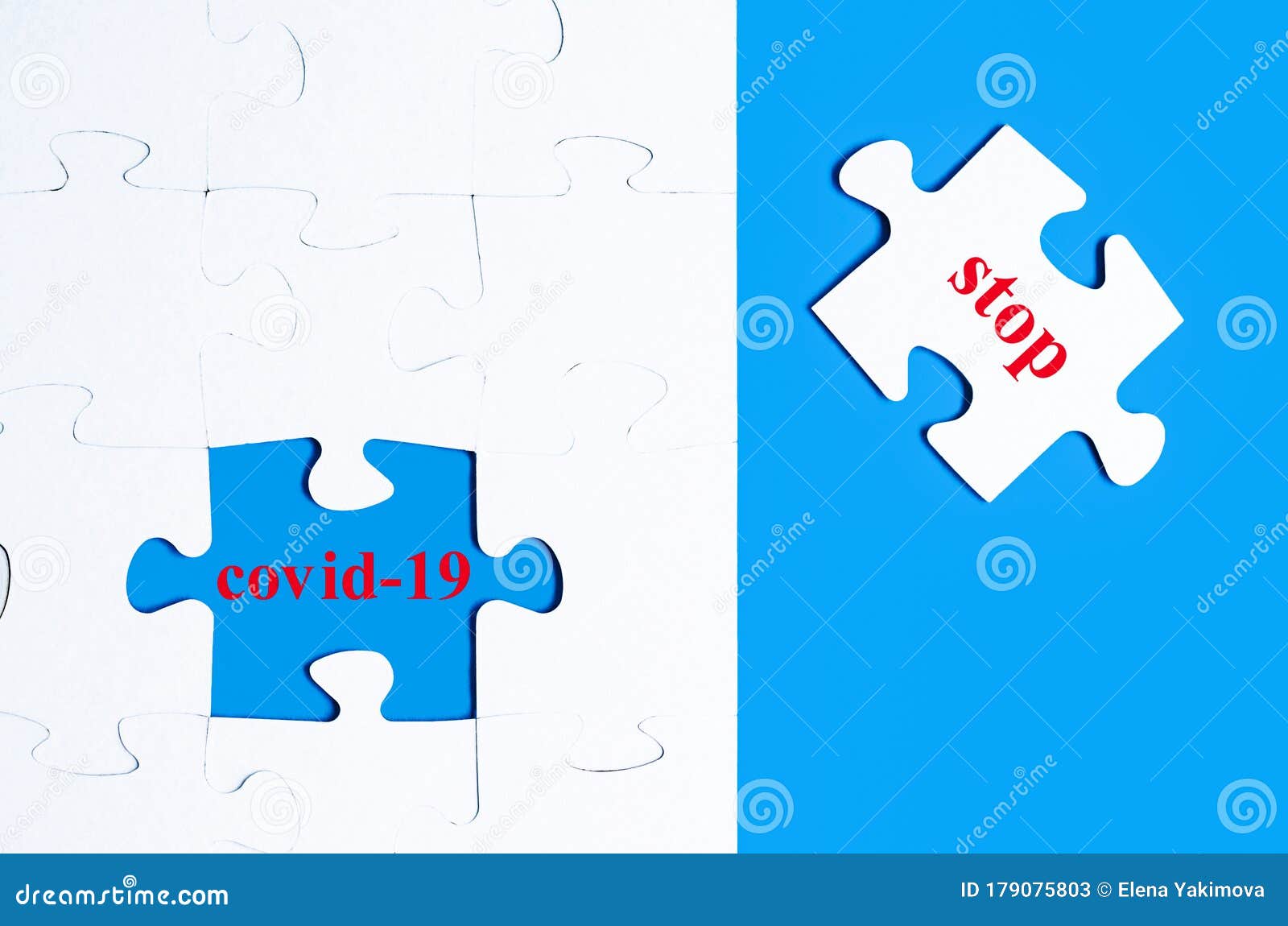 jigsaw puzzle with the words covid-19 and stop. coronavirus pandemia infection