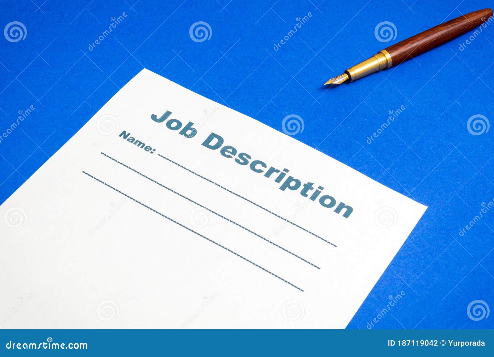 Job Description Template on the Blue Office Desk with Pen Stock Photo
