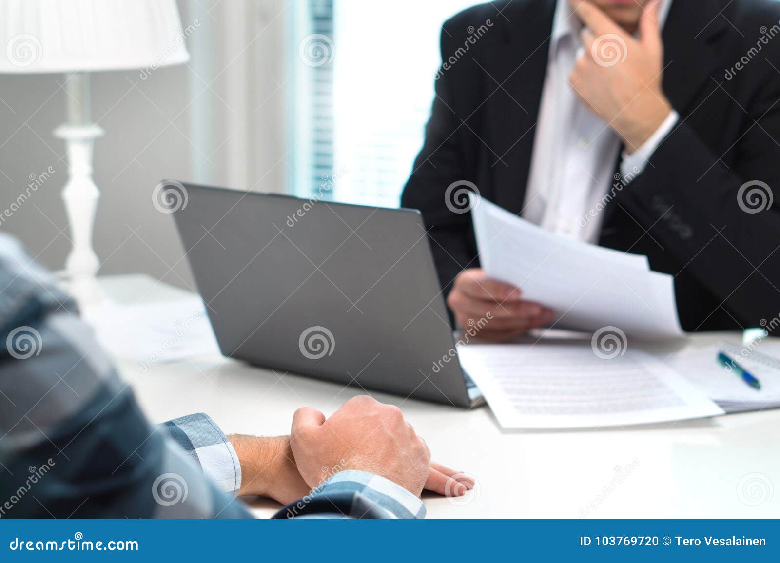 job interview or meeting with bank worker in office.
