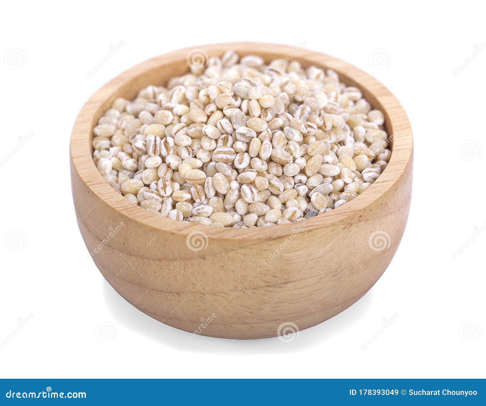 job`s tears or coix lacryma-jobi in a wooden bowl an  on white background