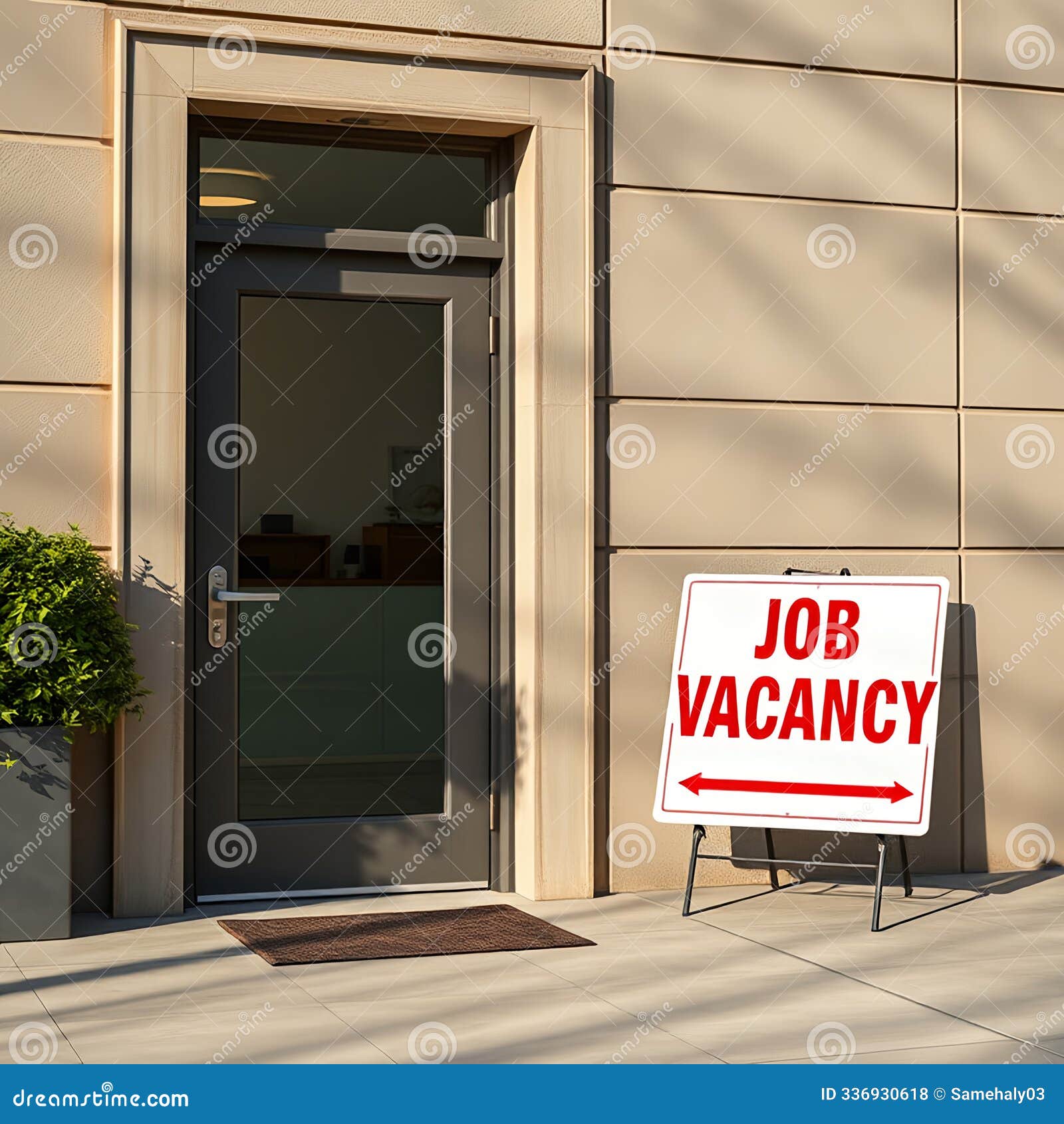 job vacancy sign next to company's door