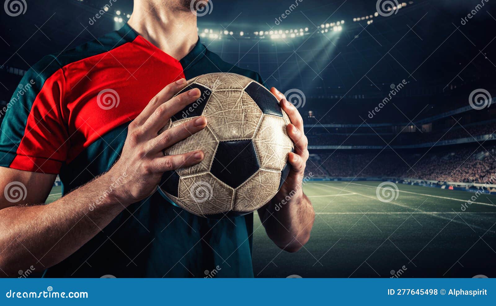 Jogador De Futebol Pronto Para Jogar Com a Bola De Futebol Foto de