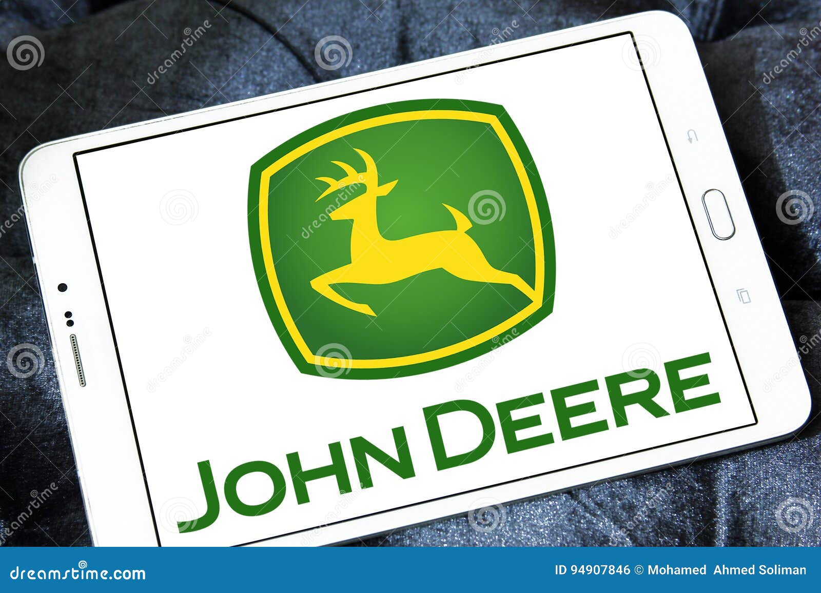 John Deere Logo Sign On A Retail Storefront Stock Photo - Download