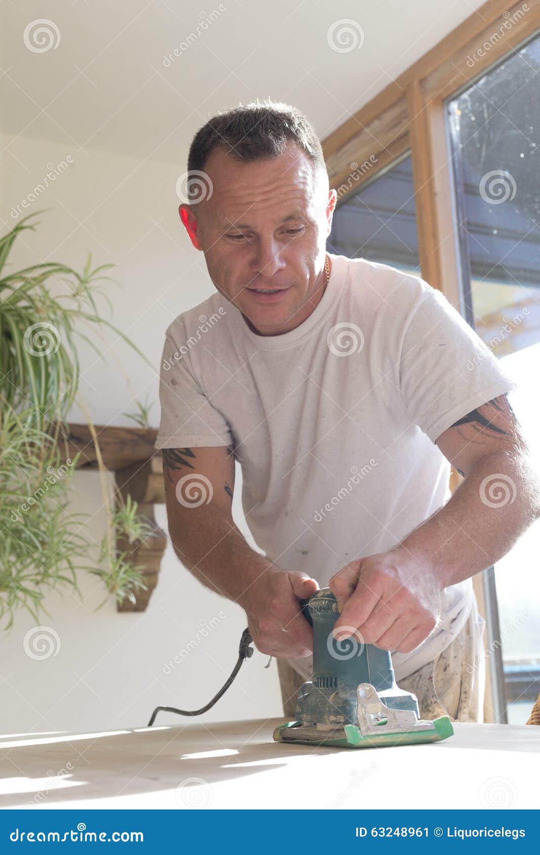 Joiner Using a Sander on a Table Surface Stock Image Image of