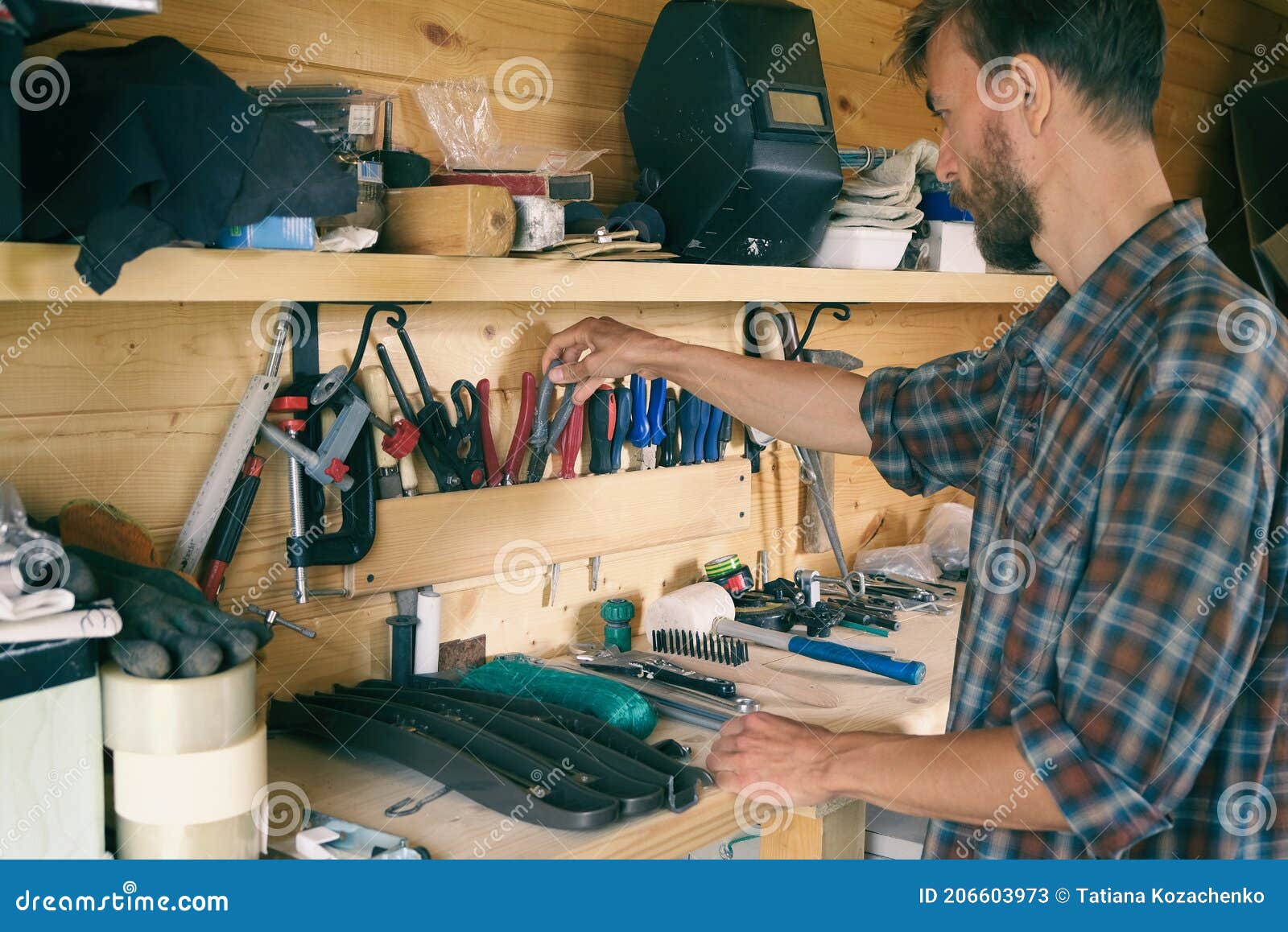 Joiner Woodworker Choosing Construction Carpentry Tools in His