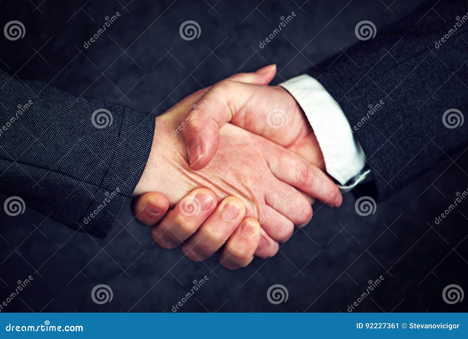 joint enterprise handshake over business agreement