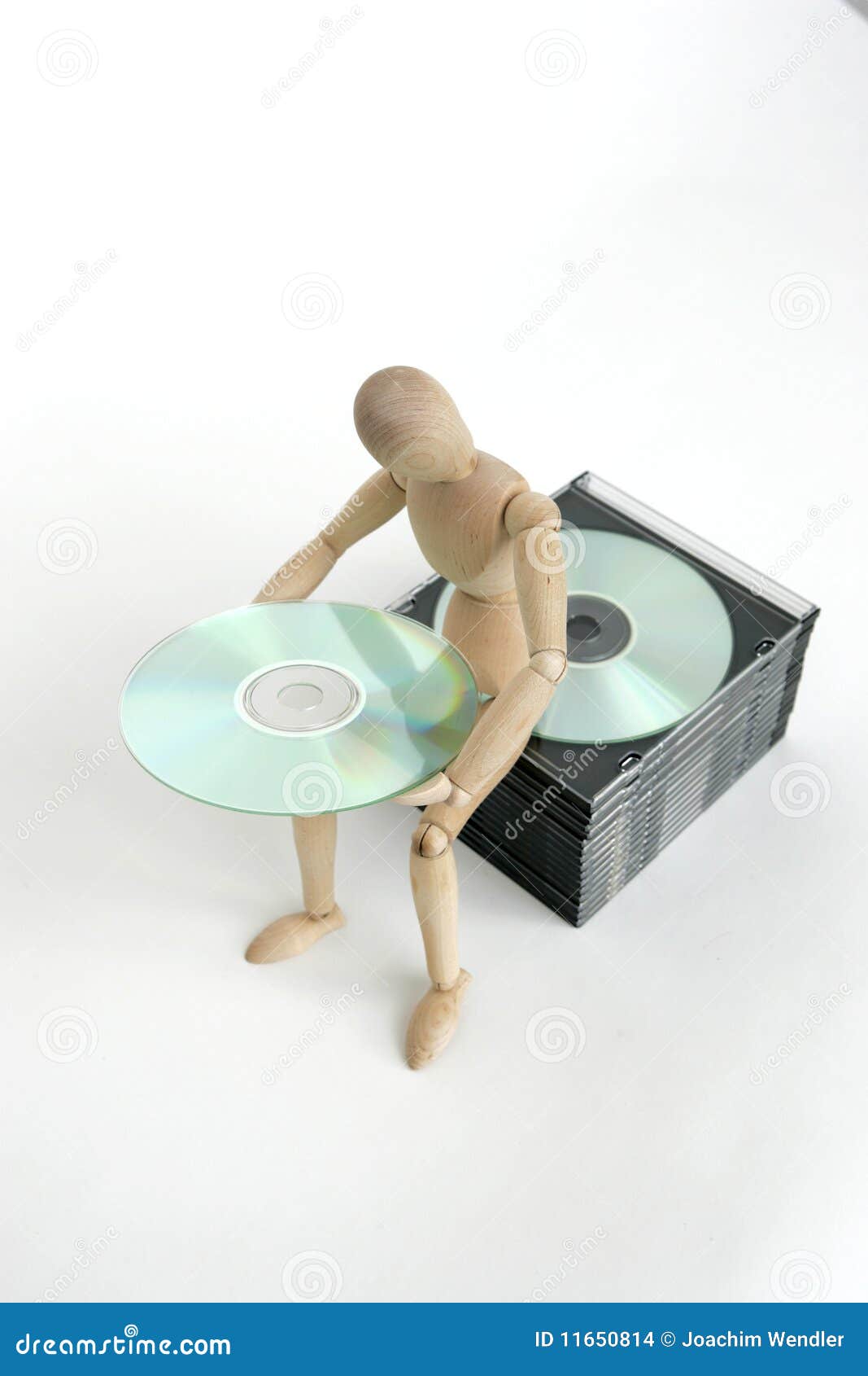 jointed doll sitting cd stack