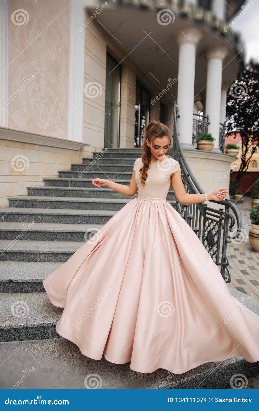 Joung Model with Great Evening Dress Stand by the Restaurant. Brunette Girl Has Beautiful Hair Style and Makeup Stock Photo - Image of caucasian, people: 134111074 Joung Model with Great Evening Dress Stand by the Restaurant. Brunette Girl Has Beautiful Hair Style and Makeup Stock Photo - Image of caucasian, people: 134111074