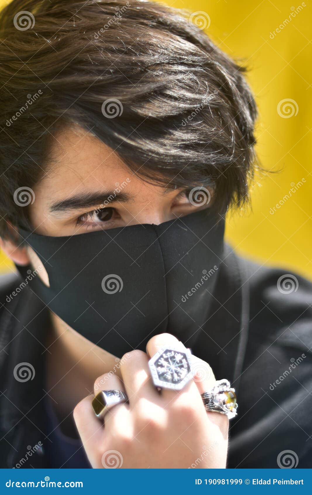 portrait of young man with face mask