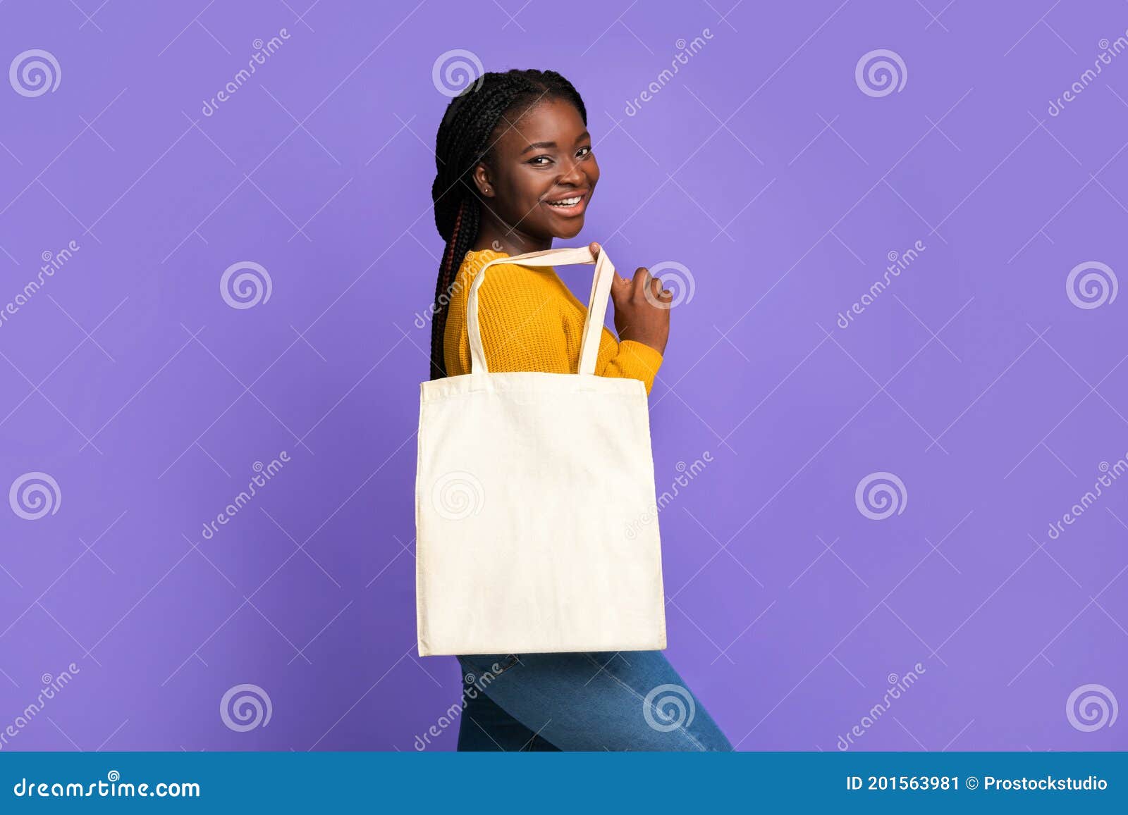 Joyful African Female Posing with Blank Tote Bag with Mockup for Design ...