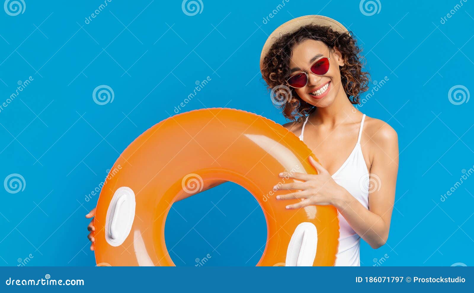 Joyful Afro Girl Going To Swim with Orange Inflatable Ring Stock Image ...