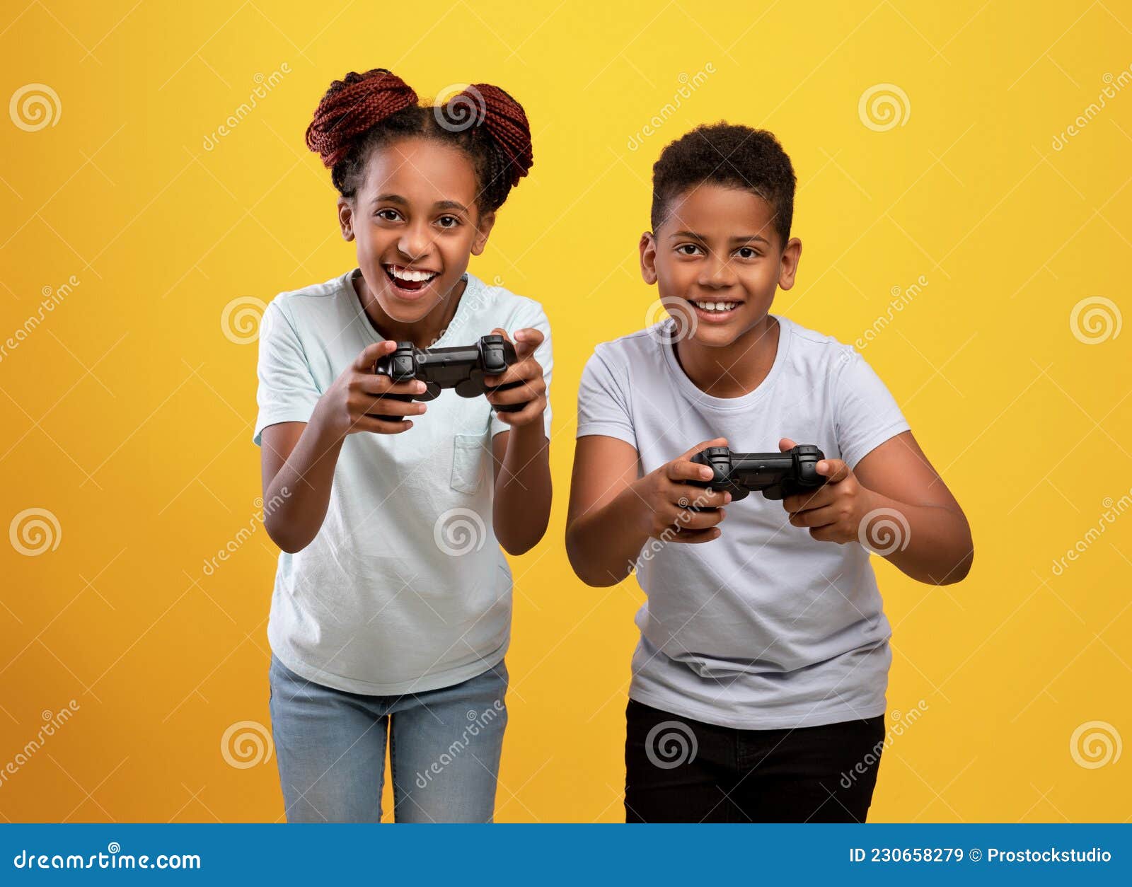 Happy Afro American girlfriend and boyfriend play games on