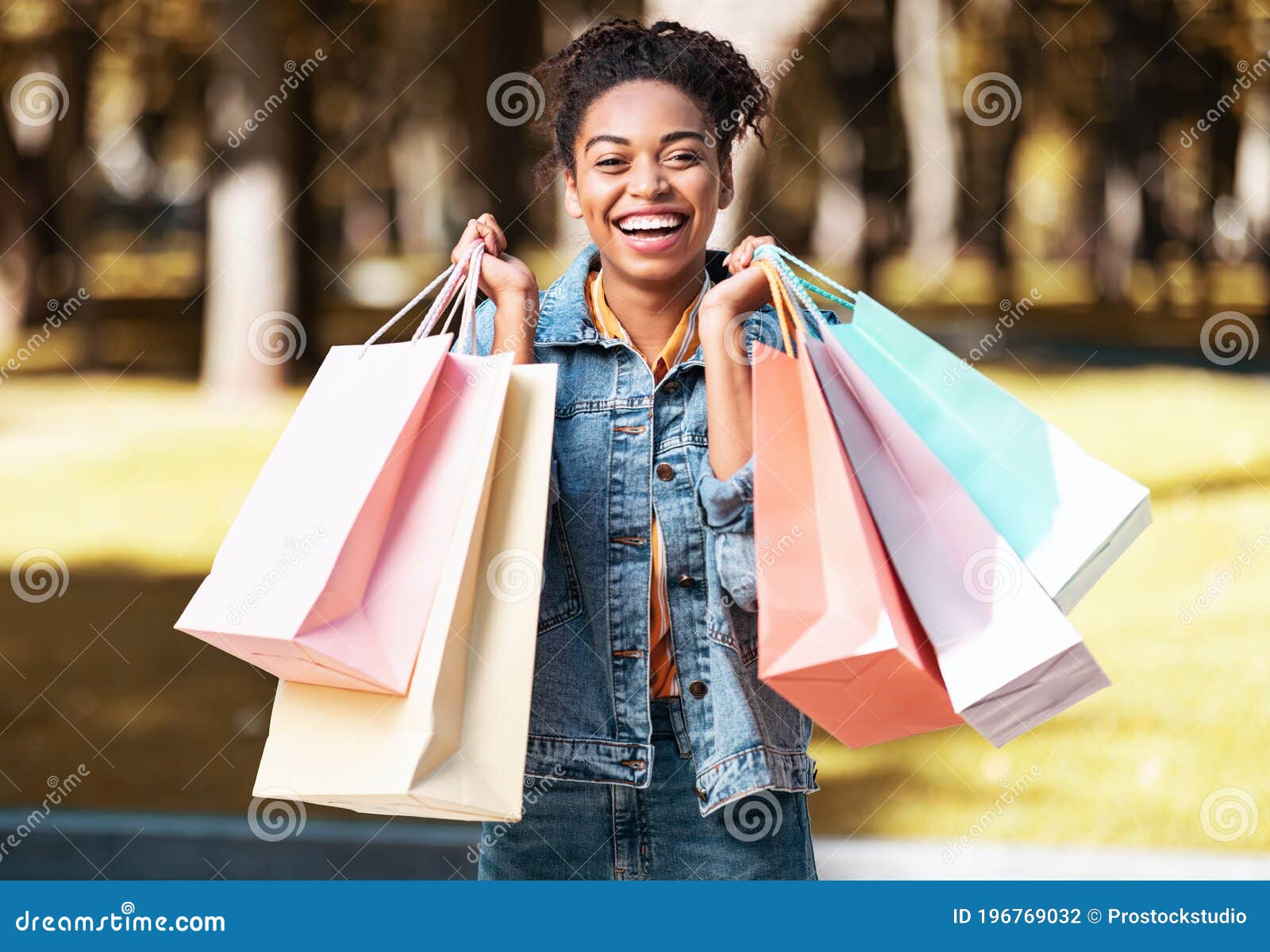 Joyful Black Lady after Shopping Holding Shopper Bags Standing Outside ...