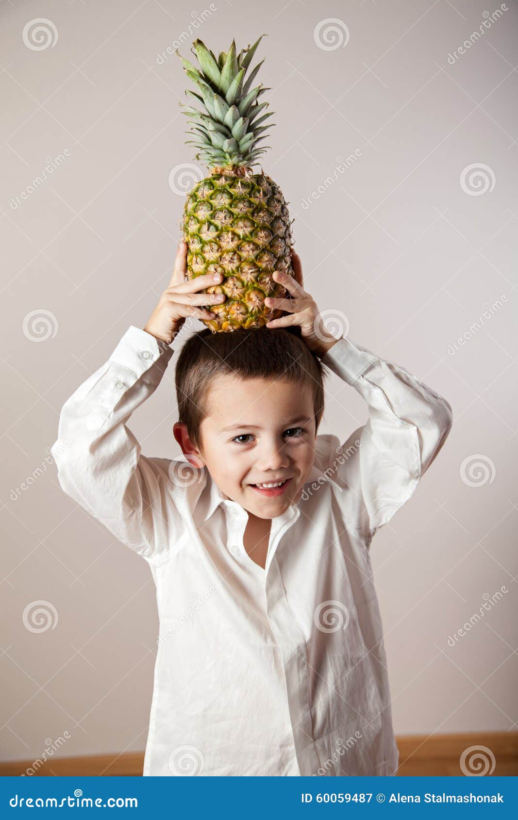 Joyful Boy with a Pineapple on His Head Stock Image Image of color