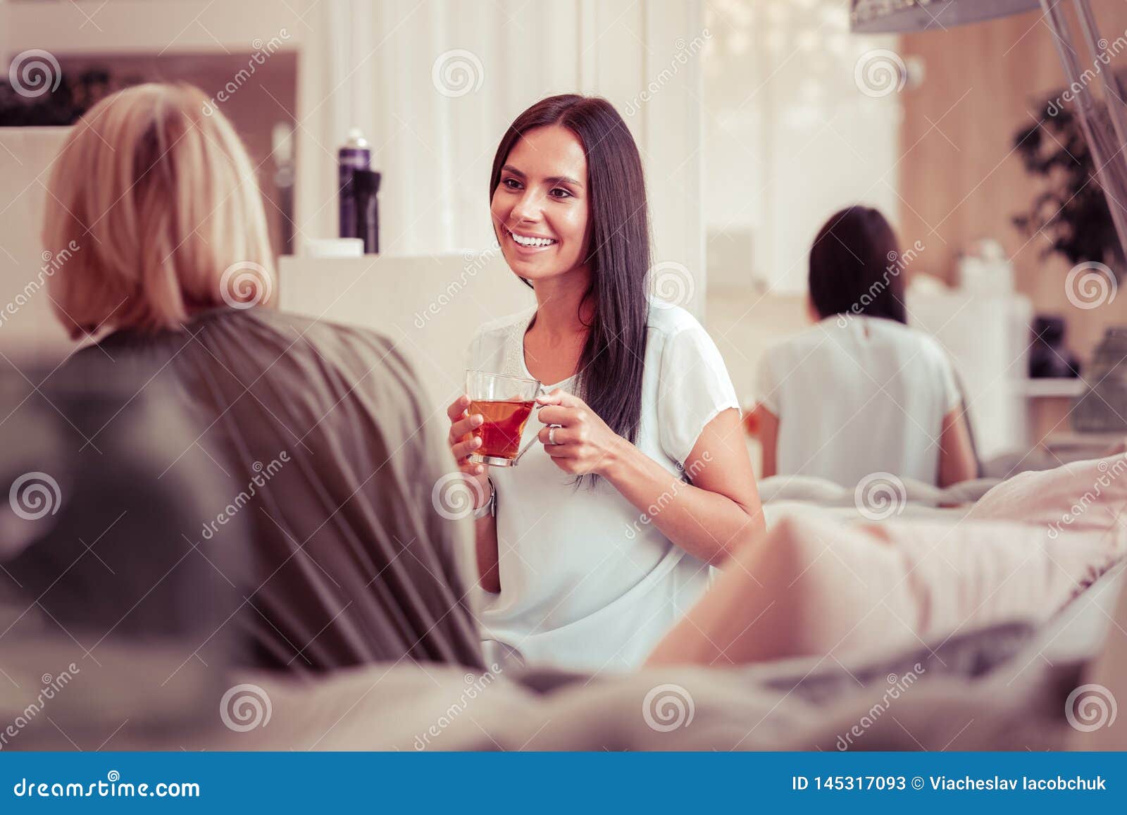 Joyful Brunette Girl Listening To Her Interlocutor Stock Image Image Of Convenient Client 