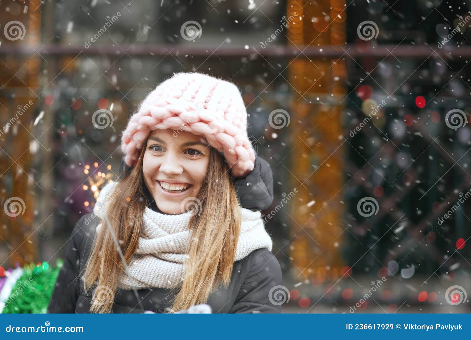 Joyful Lady Playing with Sparklers during the Snowfall Stock Image ...