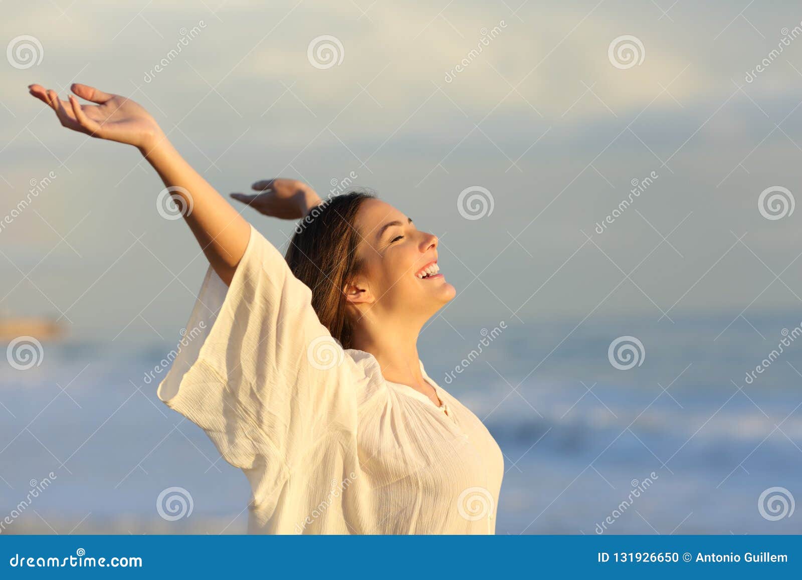 joyful woman enjoying a day on the beach