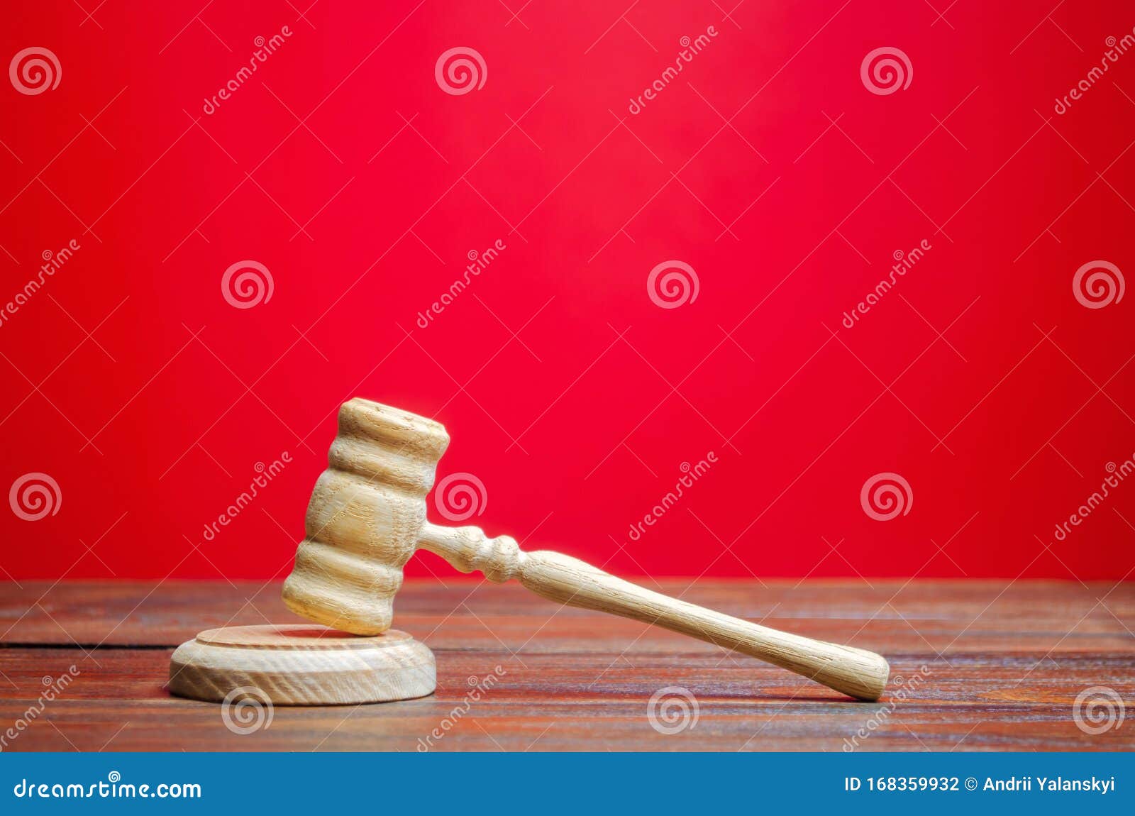 judge`s hammer on a red background. the judicial system. norms, rules and laws. conflict resolution in court. court case, settlin