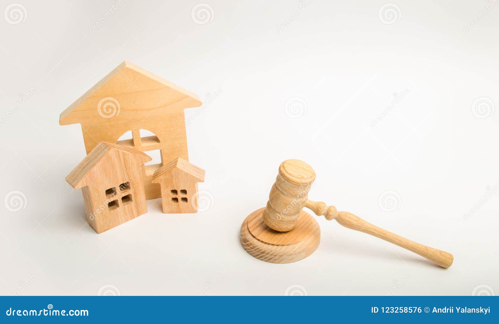 judge`s hammer and wooden houses. local government, self-government in a city or township. decentralization, reservation. adminis
