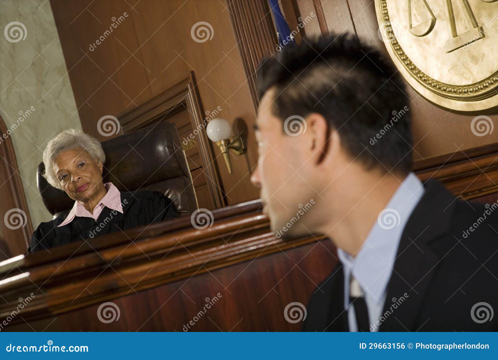 judge and witness looking at each other