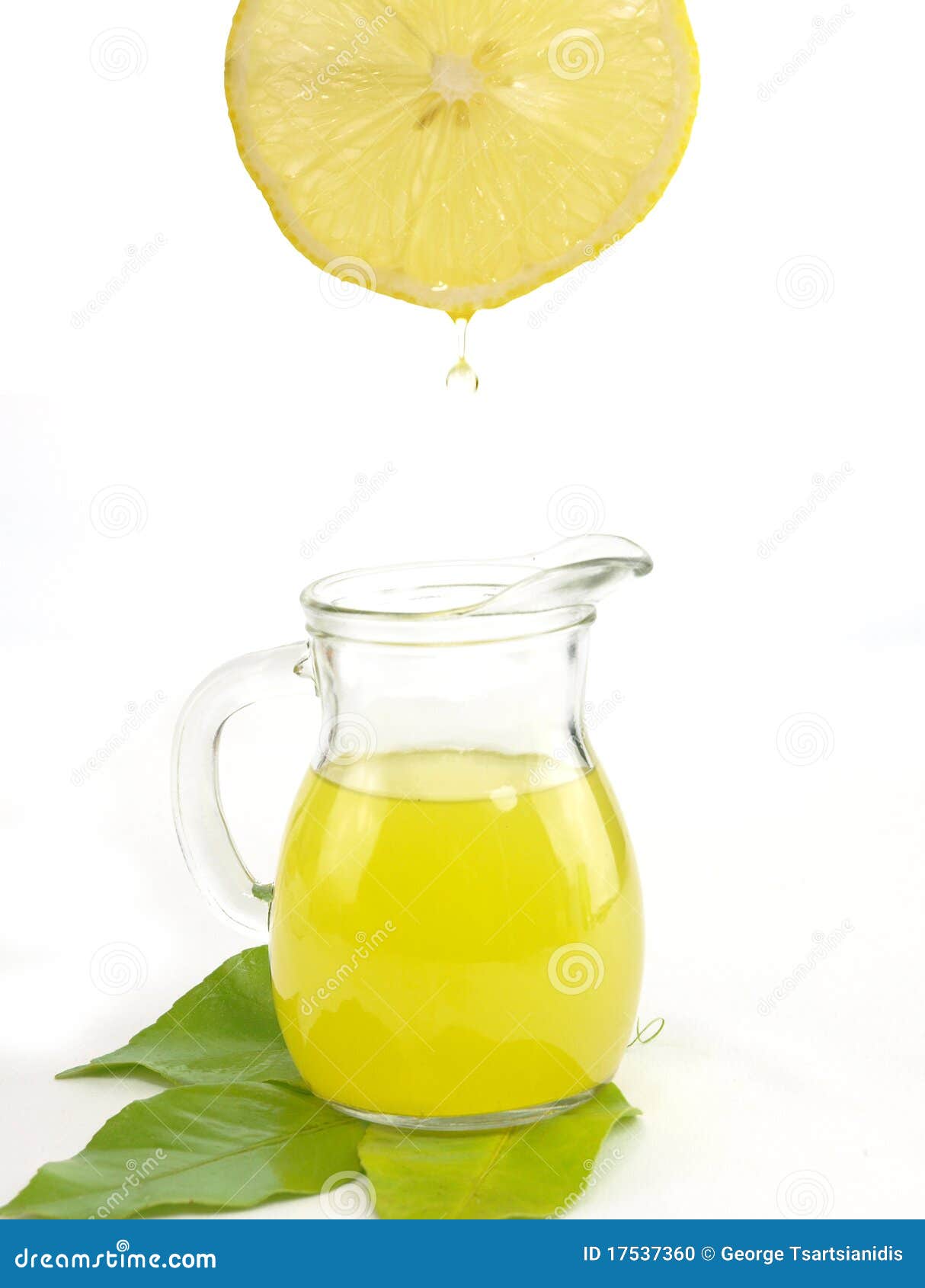 Jug of a fresh lemon juice stock photo. Image of vegetable 17537360