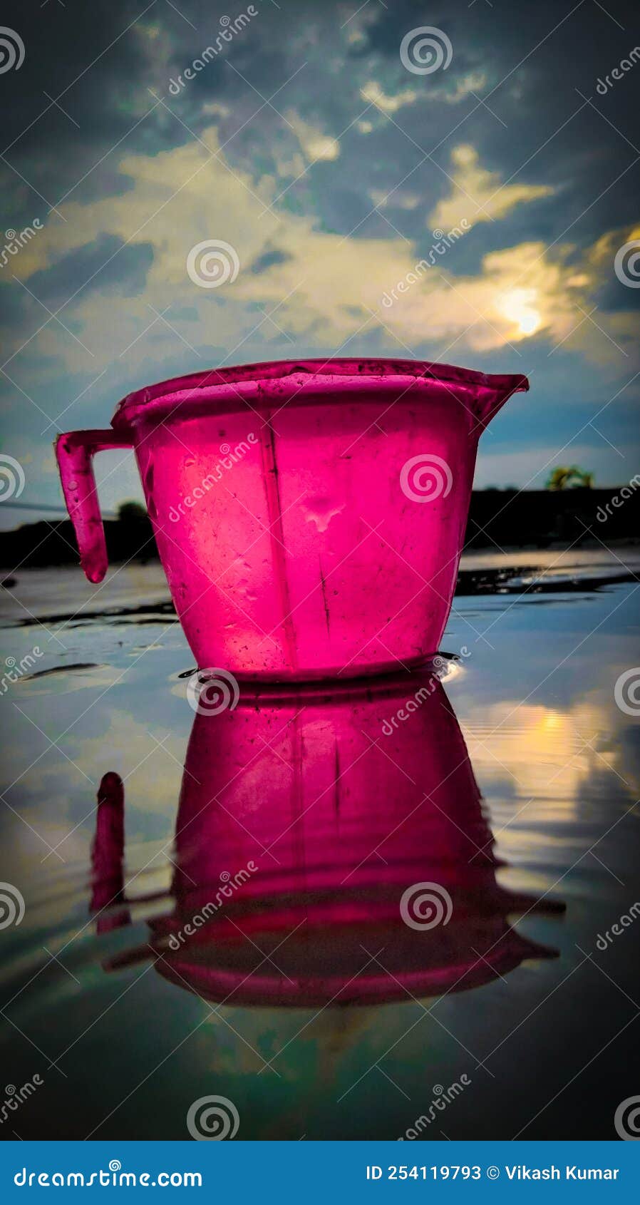 Jug of water stock image. Image of violet, petal, darkness 254119793