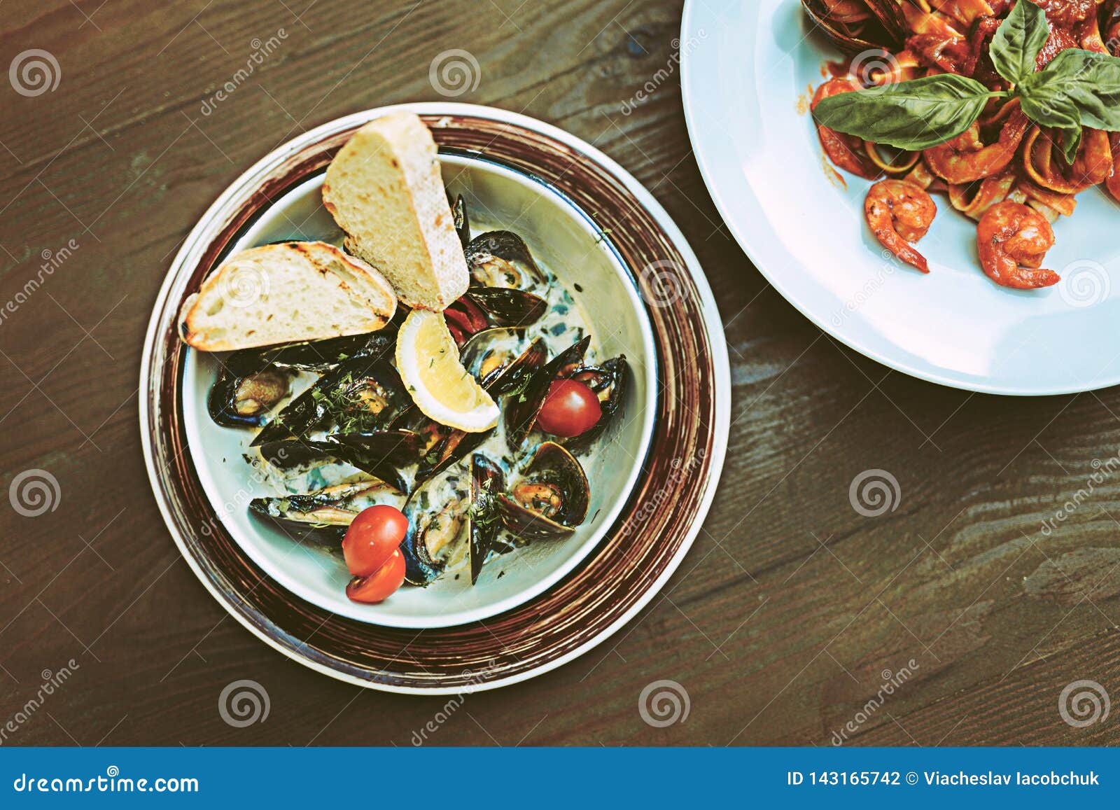 Juicy Good-looking Seafood Meals Standing Nearby on Wooden Table Stock