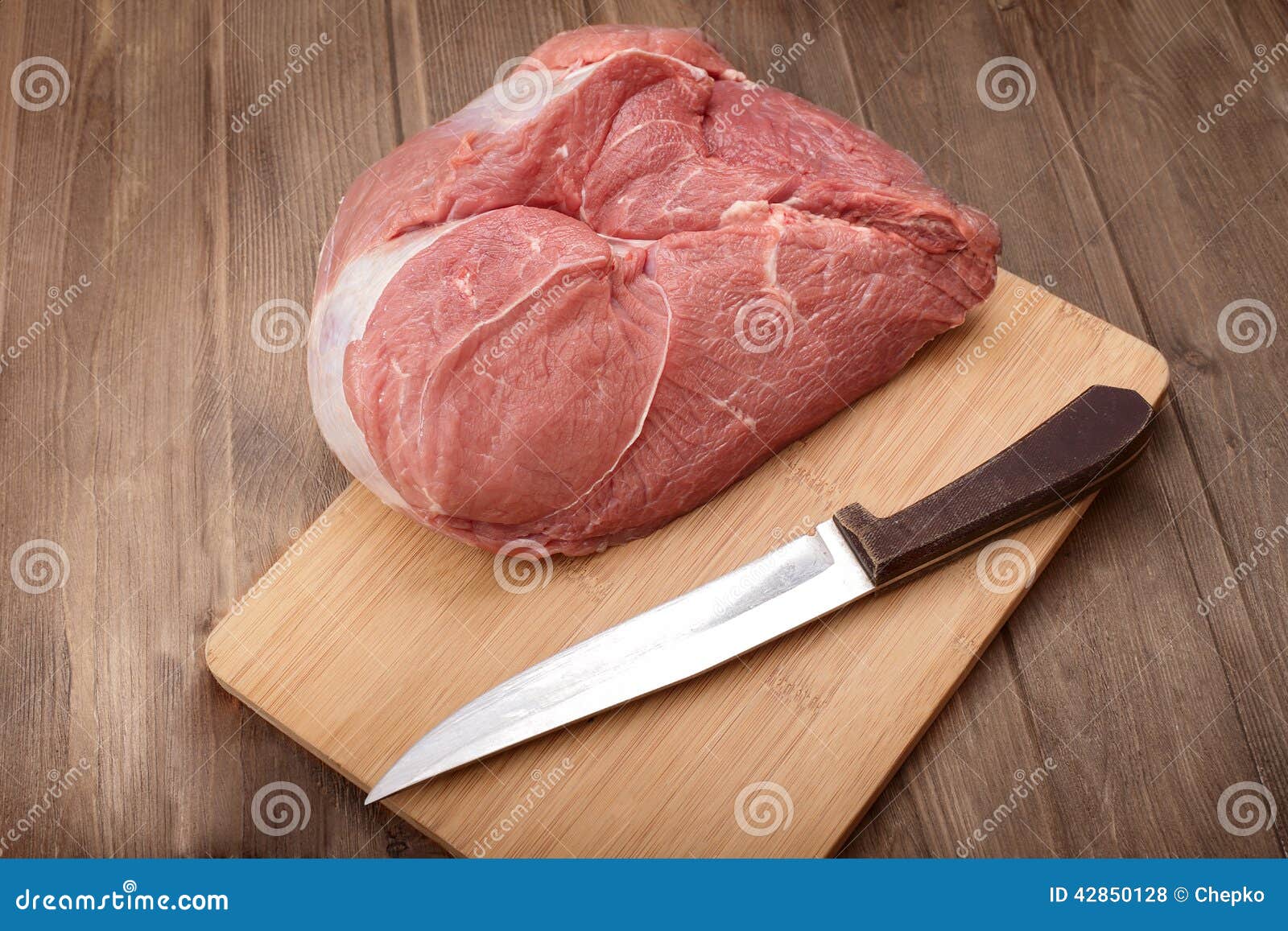 Juicy piece of raw meat stock photo. Image of hand, steak 42850128