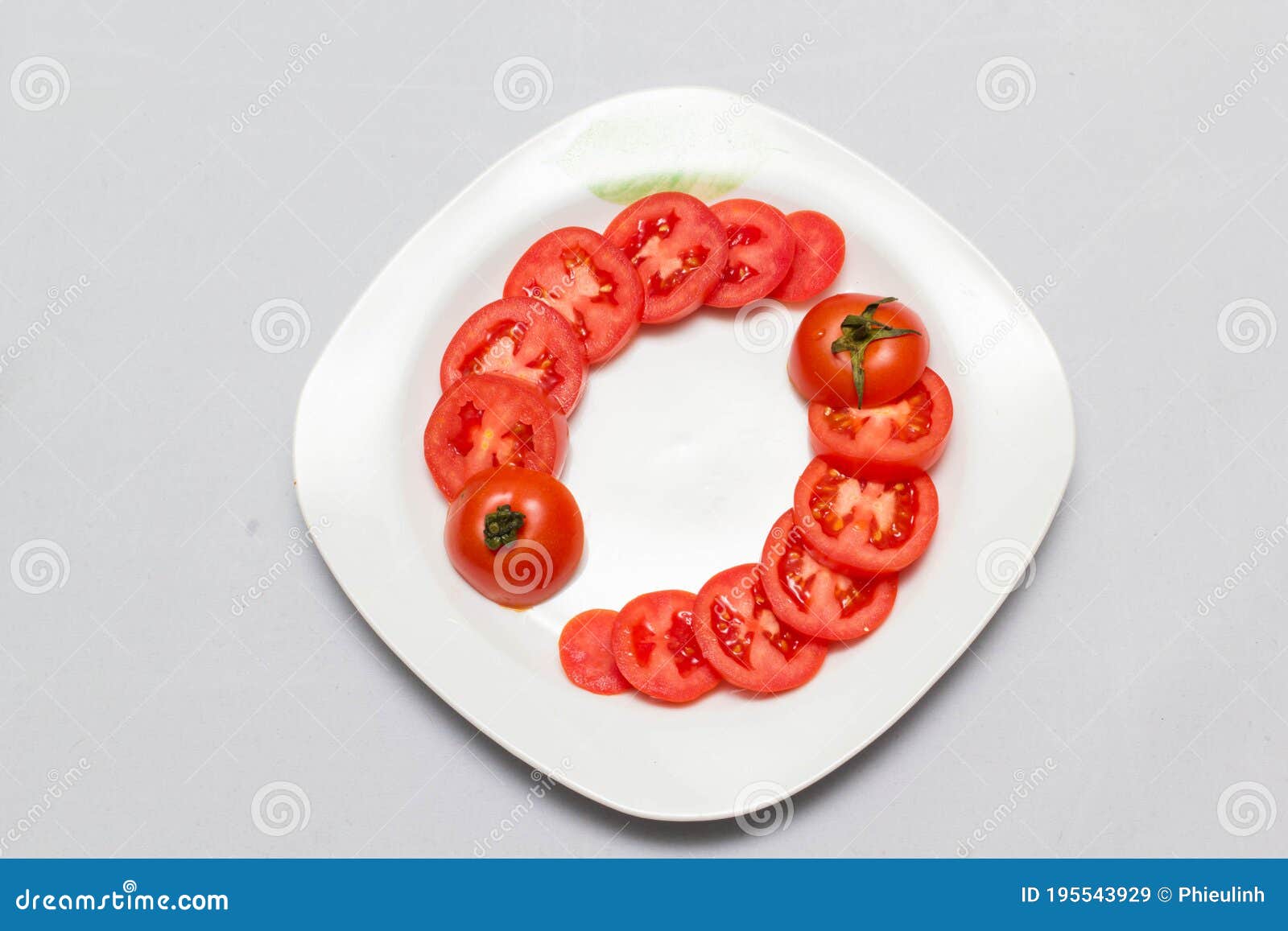 juicy red tomatoes in table cloth . caro background