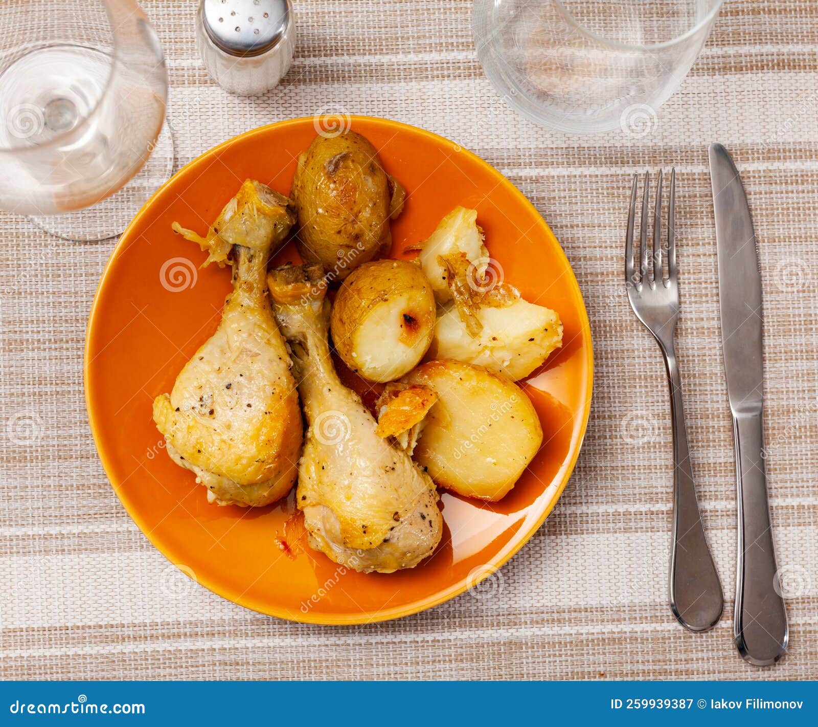Roasted Drumsticks and Potatoes Served on Table Stock Image Image of