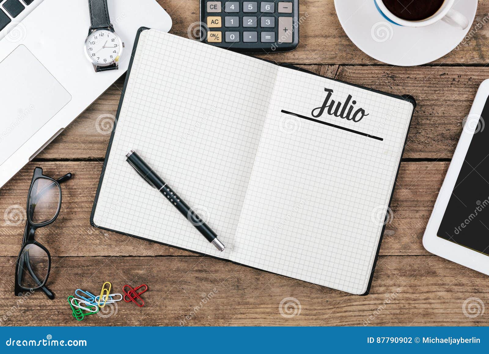 julio spanish july month name on paper note pad at office desk