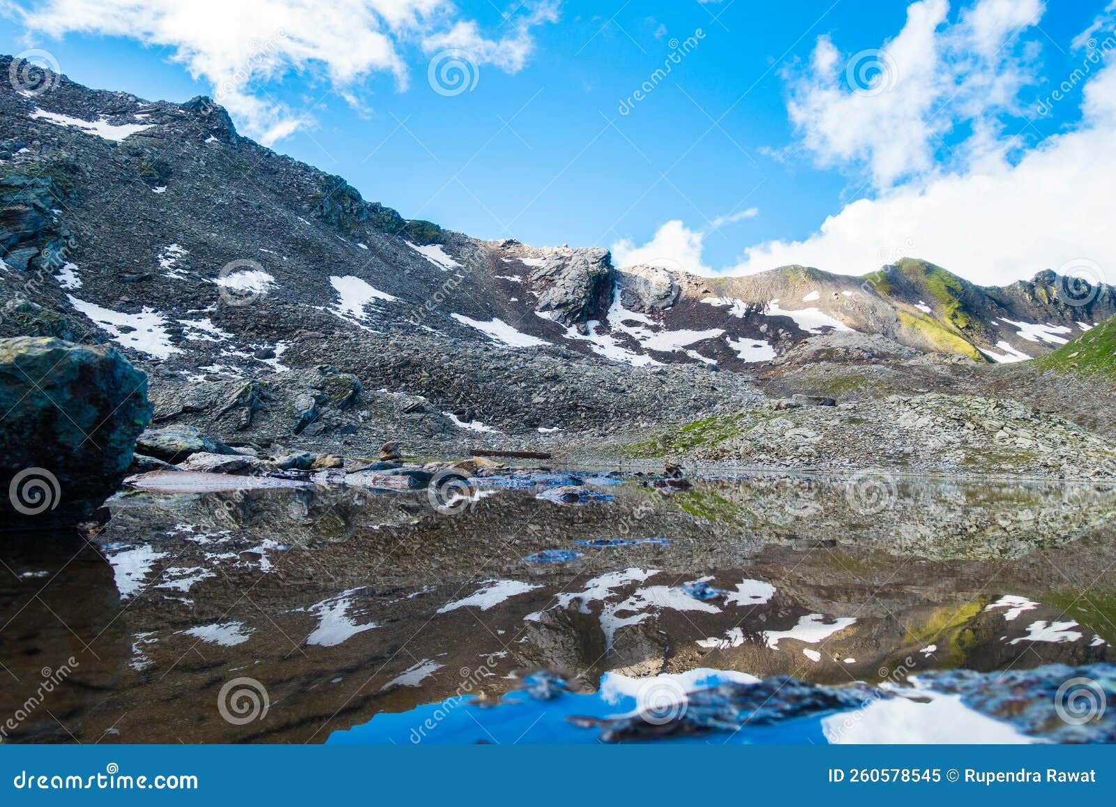 july 14th 2022, himachal pradesh india. wide angle view of nain sarovar lake . shrikhand mahadev kailash yatra in the himalayas
